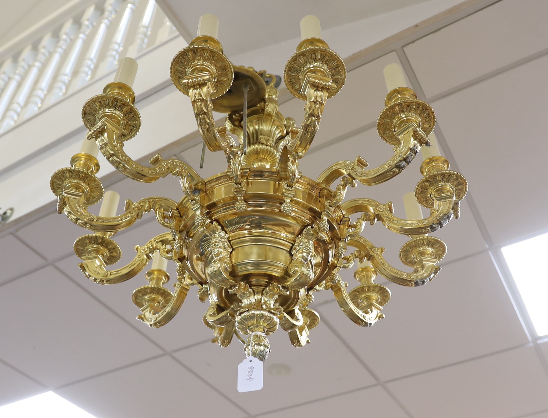 A 20th century brass and ormolu chandelier, after a design by Daniel Marot